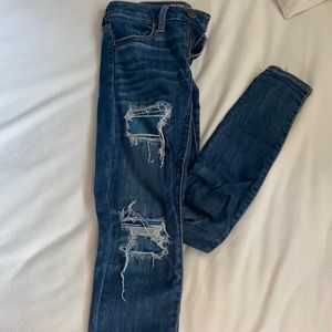 dark wash ripped skinny jeans